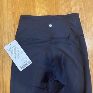 Black lululemon nulu groove pants size 4 with tags never worn